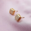 Golden square crystalline studs
