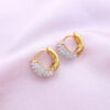 Gold plated huggie hoops covered with zircon stones
