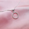 Circular stone pendant